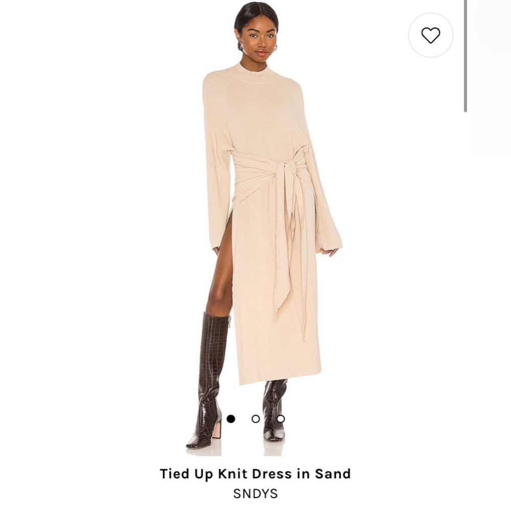 Gorgeous sweater dress with the tie detail front. Very comfy & sexy